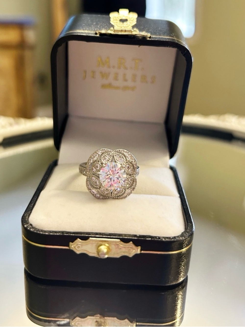 Silver Floral Halo Engagement Ring with Clear Center Stone